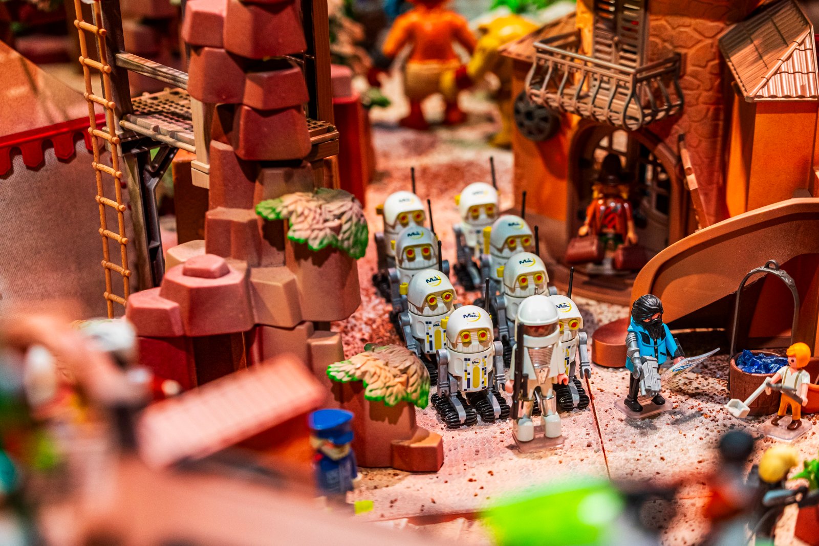 Robots on parade in a red rock canyon