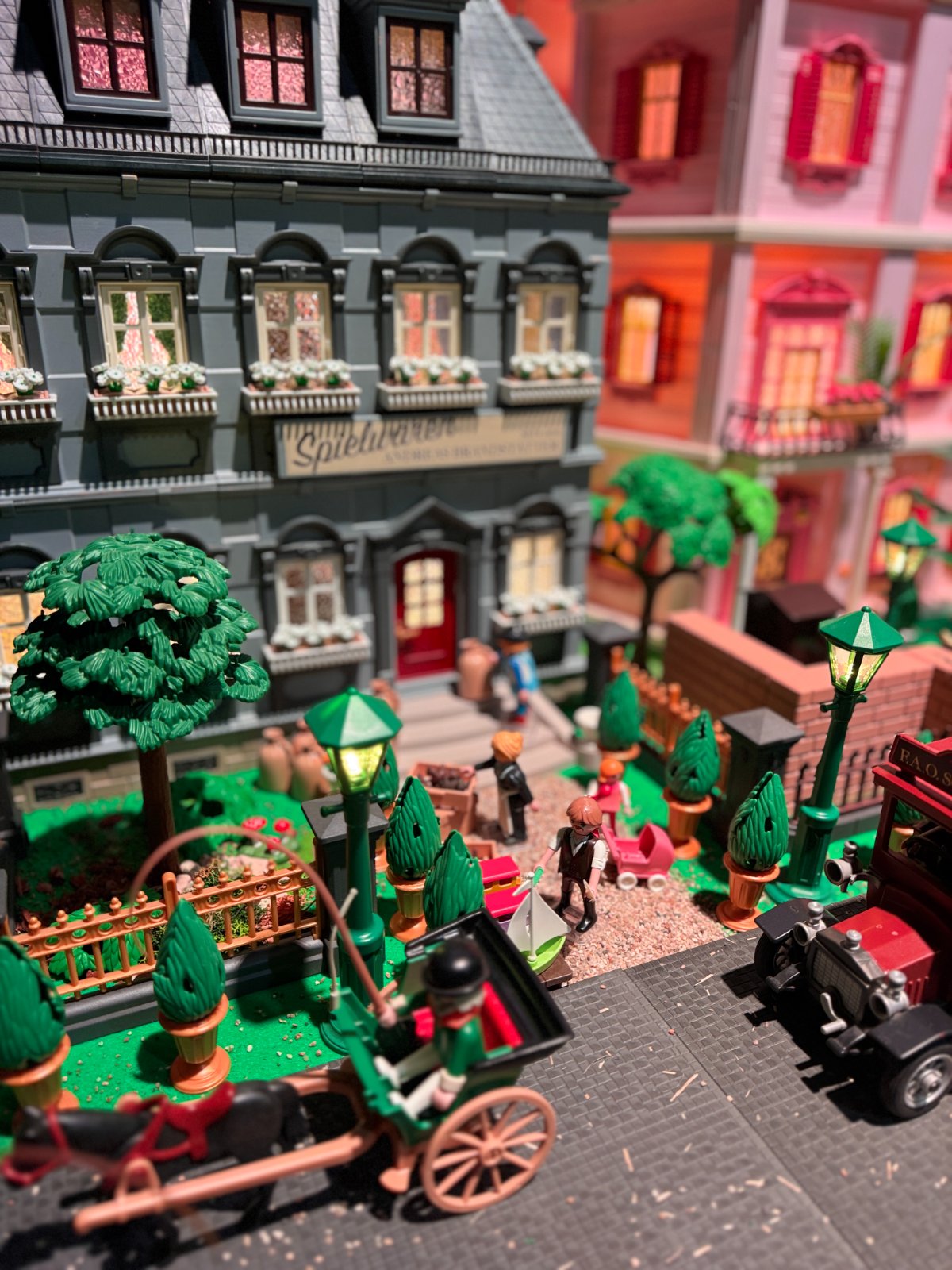 Victorian street with a toy shop and street lamps